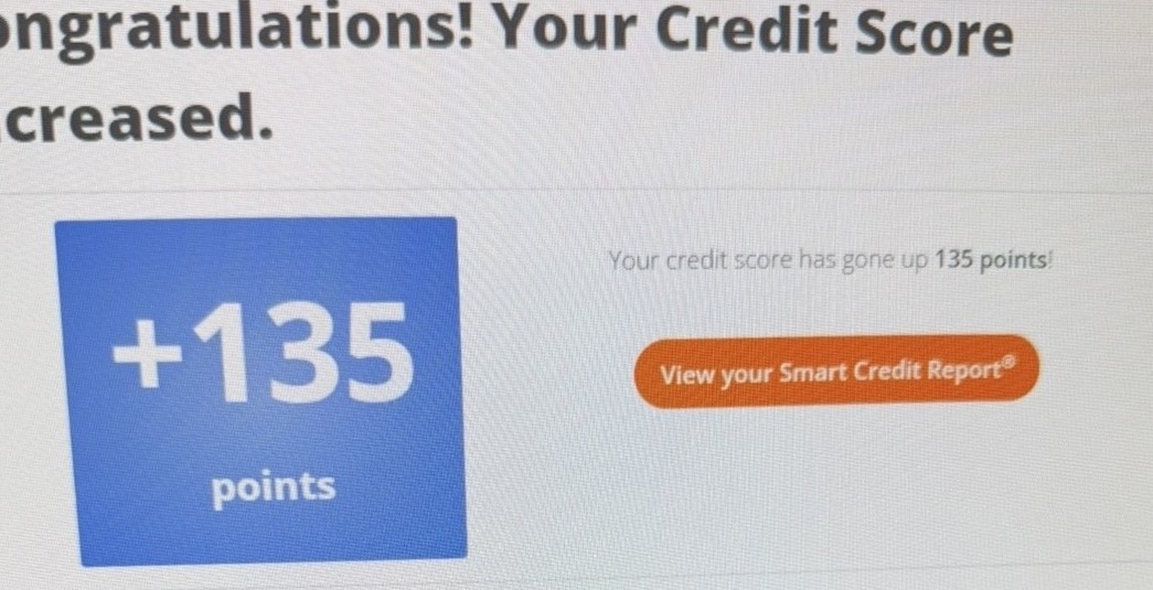 Credit monitoring alert showing a 135 point score increase